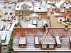 Snowy roofs of Prague